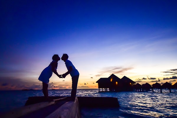 J & N Honeymoon Portrait at Baros Maldives — frame 10