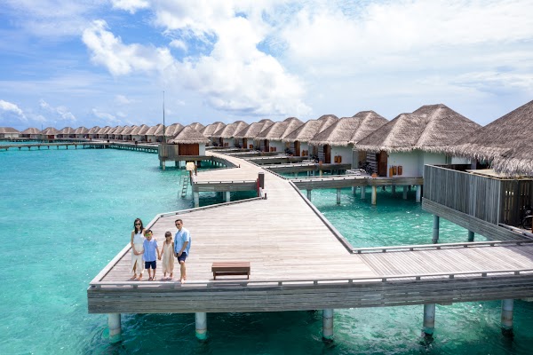 S & B Family Portrait at Dusit Thani Maldives — frame 9