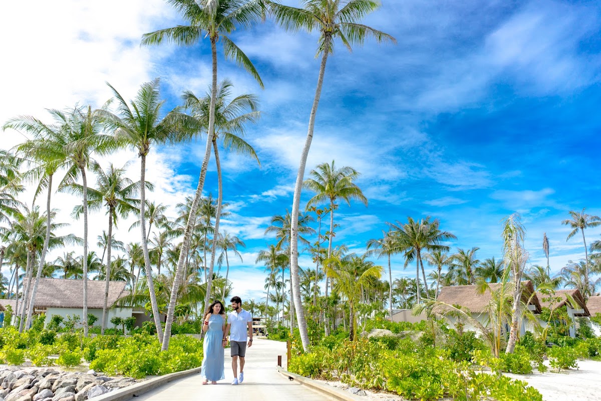 S & R Honeymoon Portrait at Hard Rock Hotel Maldives — frame 13