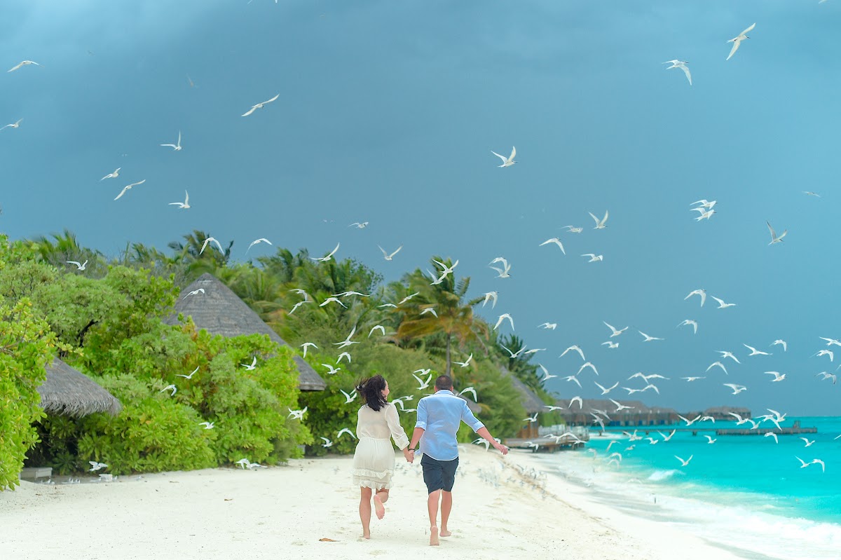 J & L Honeymoon Portrait at Conrad Maldives Rangali Island — frame 12