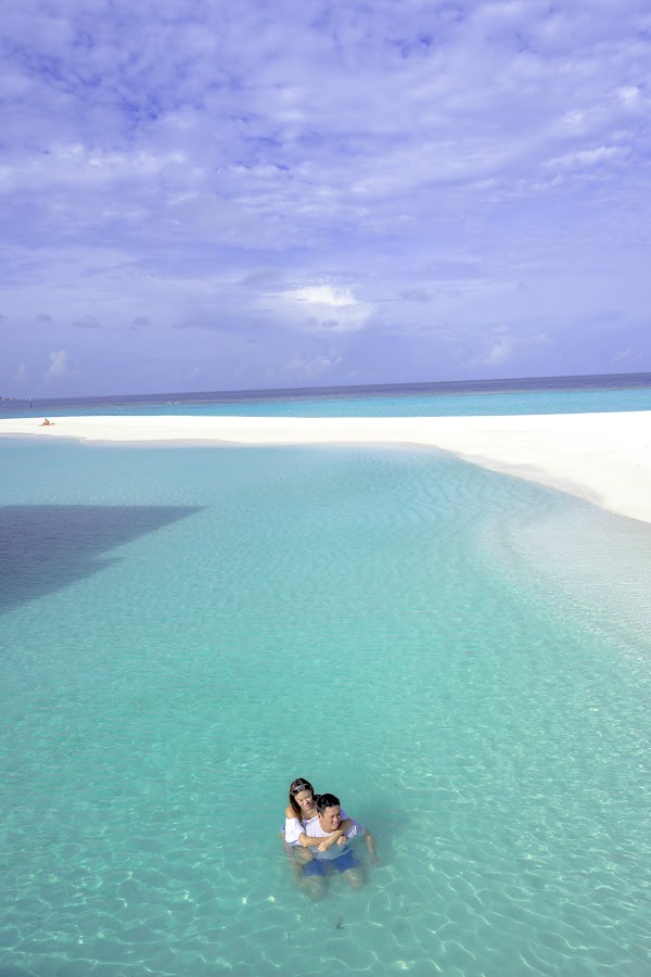 A & H Honeymoon Portrait at Amari Havodda Maldives — frame 6