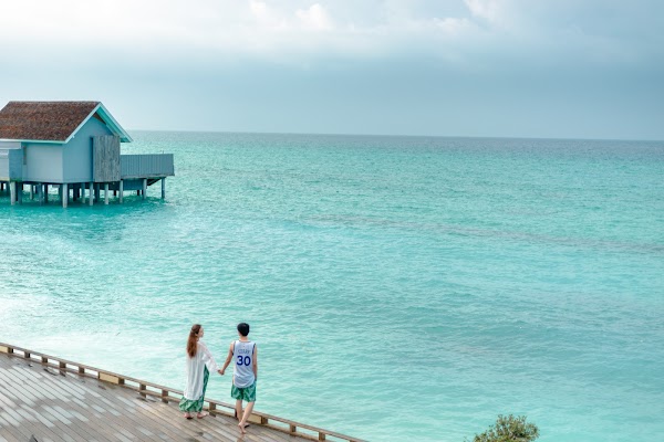 J & H Honeymoon Portrait at Kuramathi Maldives — frame 9