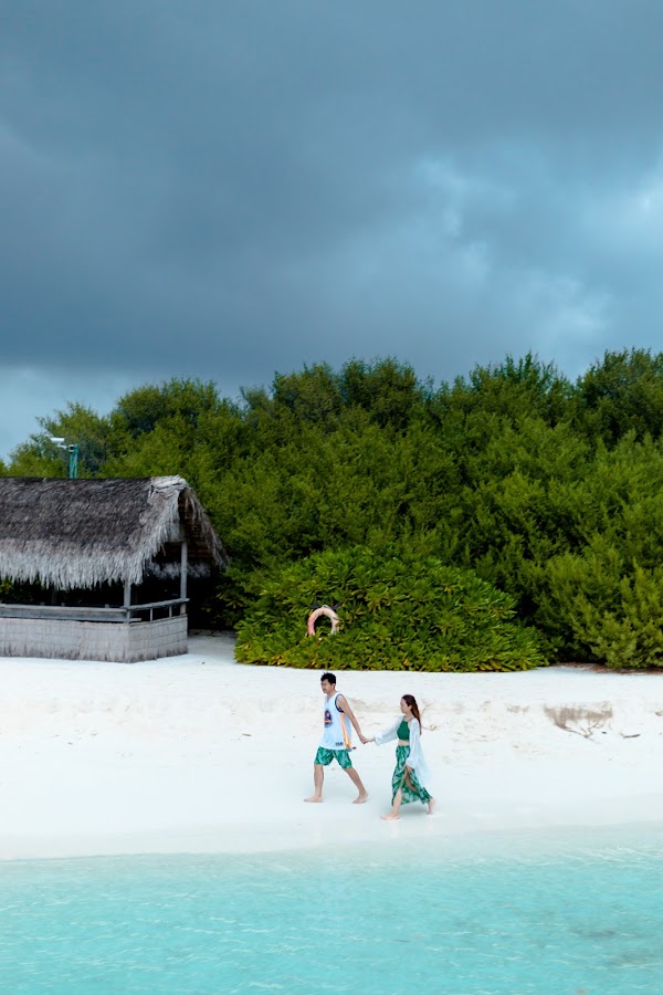 J & H Honeymoon Portrait at Kuramathi Maldives — frame 7
